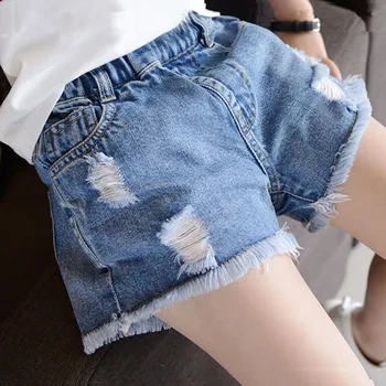 Дънкови къси панталони за момичета, лятна нова детска корейската версия на модни памучни скъсани дънкови шорти Изображение